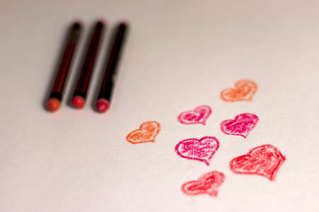 Sketch of heart shapes by colored crayon on canvas paperの写真素材