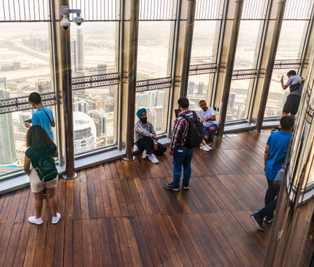 Dubai, UAE - 07.18.2021 -Visitors at the highest observation deck in world. 125th floor of Burj Khalifaのeditorial素材