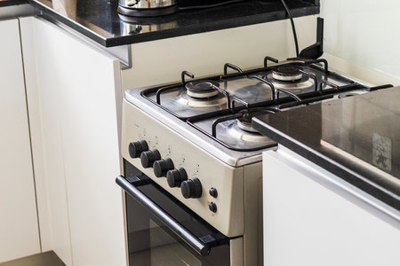 Close up shot of a kitchen in modern apartmentの写真素材