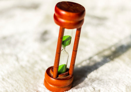 Closeup shot of a hourglass on white background