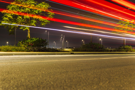 Shot of a light trail on the night road