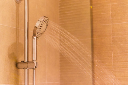 Close up shot of a shower in a bathroom.