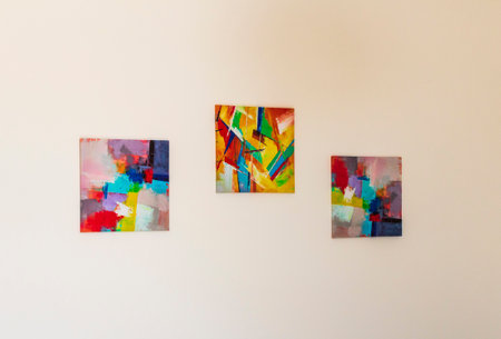 Shot of a bright paintings on the wallの写真素材