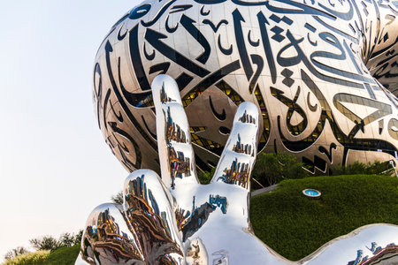 Dubai, UAE - 10.02.2022 - At the entrance of a very well known landmark Museum of Future. Win, Victory, Love sculptureのeditorial素材