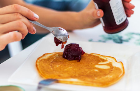 Close up shot of a home made pancake on the plateの写真素材