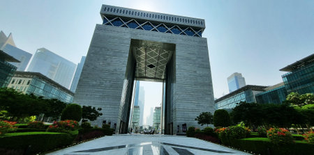 Dubai, UAE - 10.31.2022 - Shot of the gate building of Dubai international financial centre