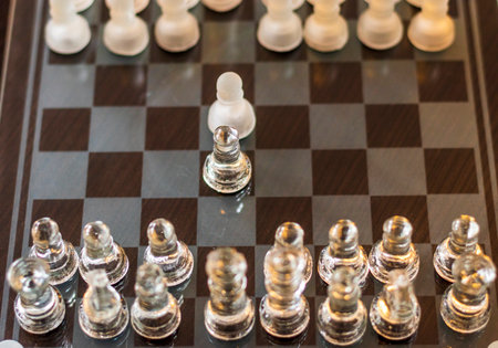 Close up shot of the chess board made of glass