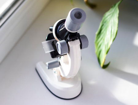 lose up shot of the microscope on the windowの写真素材