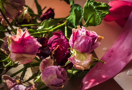 Concept shot of the background theme, wrapping paper, dried roses other flowers and other arrangementsの写真素材