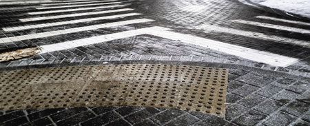 Concept shot of the pedestrian crossing markings on the winter road