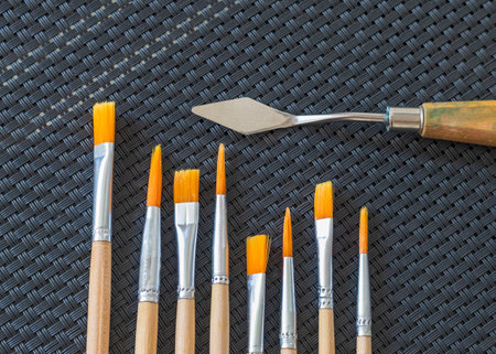 Shot of the different painting brushes with sizes marking on them.の写真素材
