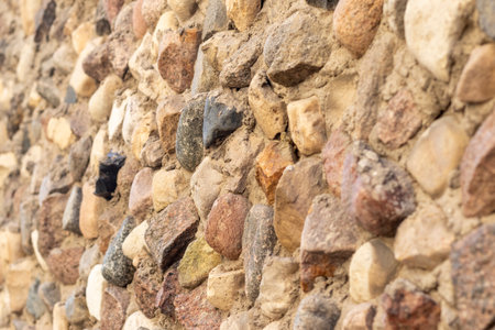 Concept shot of the rough wall made of stonesの写真素材