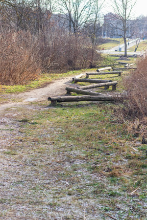 Wooden logs as a element of physical exercise equipment in the parkの写真素材