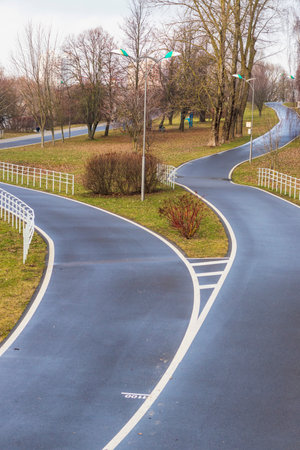 Jogging, walking, cycling path in the park.