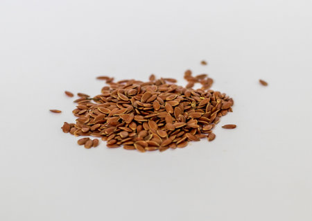 Close up shot of flax seeds on white backgroundの写真素材