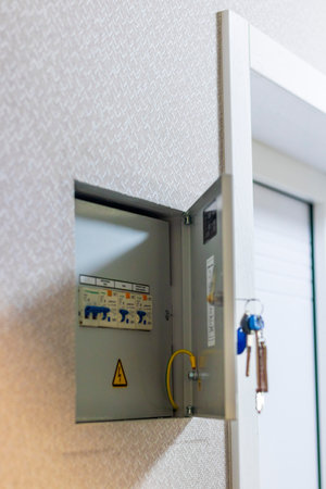 Open electrical switchboard in the apartment
