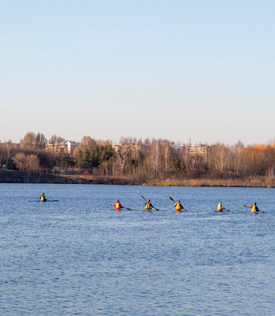 Group of people kayaking on the open water