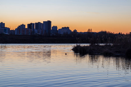Sun set over a large water reservoirの写真素材