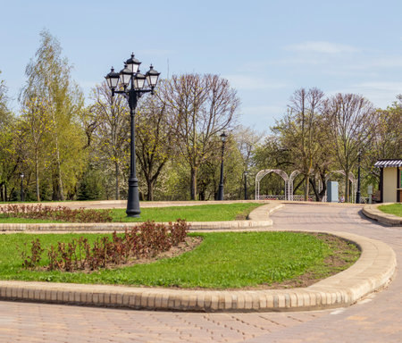 Vintage, cast iron street lamp post in the parkの写真素材