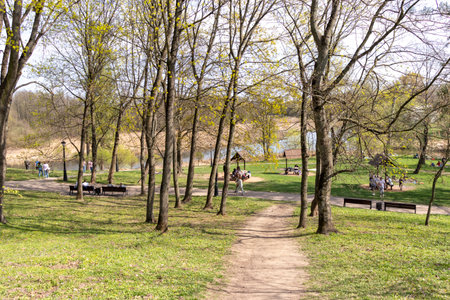 Minsk, Belarus - 05.04.2025 - People enjoying first sunny days outdoorsの写真素材