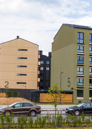 Shot of the stylish, modern, urban, residential suburb where buildings have ergonomic design and vivid colorsの写真素材