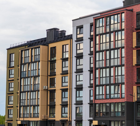 Shot of the stylish, modern, urban, residential suburb where buildings have ergonomic design and vivid colorsの写真素材
