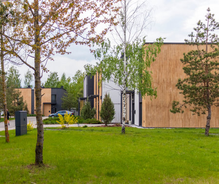 Facade of the stylish, urban, modern townhouses, ergonomically designed and made of ecological materialsの写真素材