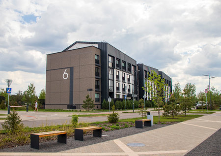 Shot of the stylish, modern, urban, residential suburb where buildings have ergonomic design and vivid colorsの写真素材