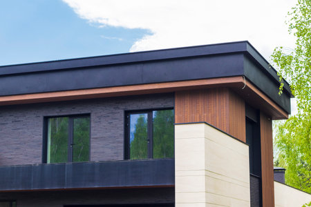Facade of the stylish, urban, modern house, ergonomically designed and made of ecological materialsの写真素材