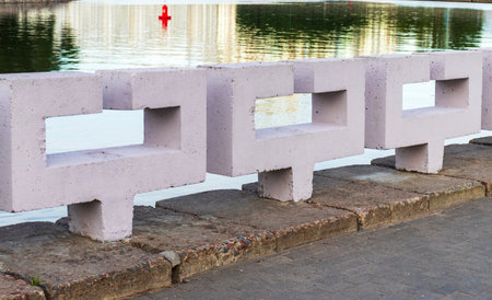 Decorative concrete fencing in the bank of the riverの写真素材