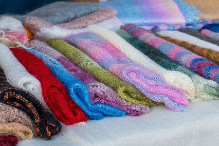 Hand woven shawls on display of the shopの写真素材