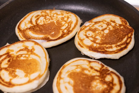 Shot of the pancakes on the frying panの写真素材