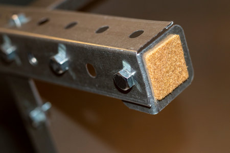 Furniture leg or part of a shelving unit, fitted with a protective felt padの写真素材