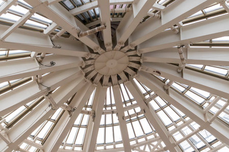 The photograph displays the interior structure of a large architectural dome or cupolaの写真素材