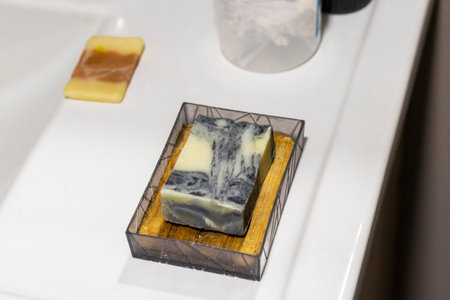 The soap bar holde Ñ†ÑˆÐµÑ€ handmade bar soap containing activated charcoal, neem oil,...