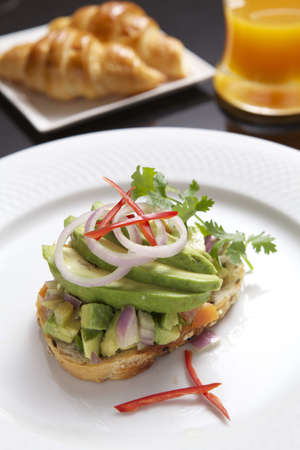 Fresh avocado salad with bread- tapas menuの素材