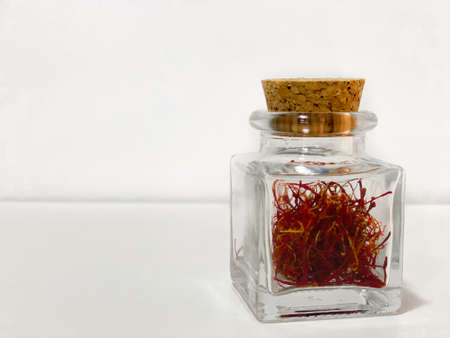 Glass little bottle with saffron inside