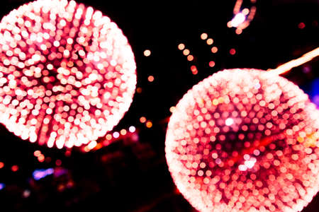 Abstract image, two red bokeh ballsの写真素材