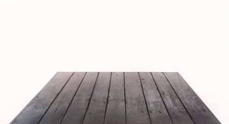 Grunge wooden table top, perspective on white background.の写真素材