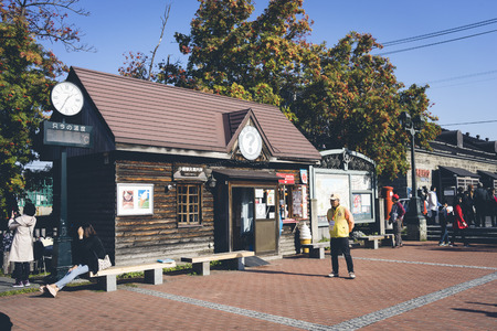 Otaru, Japan - October 19, 2017 : Unnkown tourist walking around the tourist information center of Otaru town.のeditorial素材