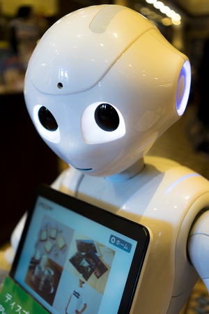 Hokkaido, Japan - October 18, 2017 :  Softbank's Pepper Robot in Sapporo. It is a humanoid robot named Pepper, which is claimed can identify human emotions and respond to them. It is used AI technology.のeditorial素材