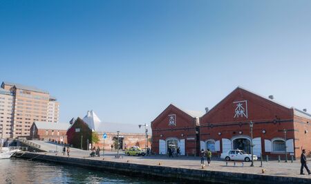 Hakodate, Japan - October 24, 2017 : Unknown tourists at Kanemori red brick warehouse district. On...