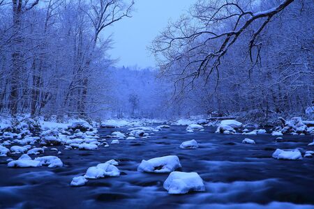 At the back of winter Oirase streamの写真素材