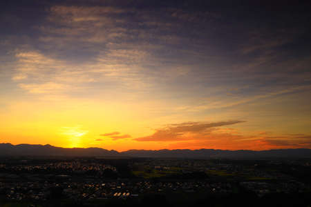 Kitakami City, Iwate Prefecture: The scenery of the city area at sunsetの写真素材