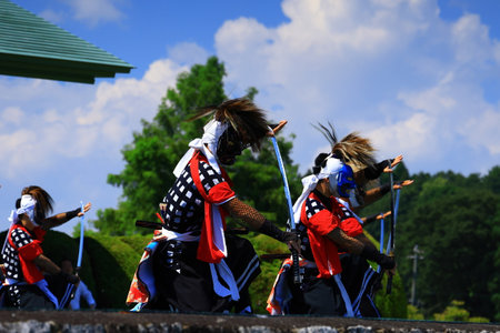 People in traditional costume performing at an event, Japanの写真素材