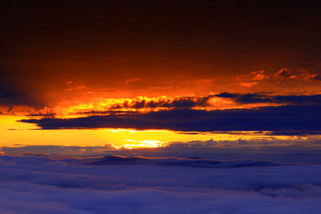 Sunset on the sea of clouds. Beautiful sky and clouds.