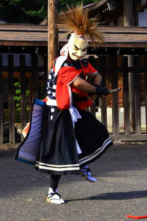 Person in traditional costume at an outdoor location in Japanの写真素材