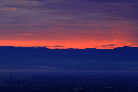 Foggy morning in the mountains. Landscape with a beautiful sky
