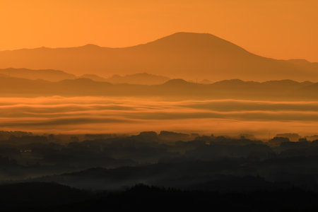 Foggy morning in the mountains. Landscape with a beautiful skyの写真素材