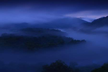 Foggy morning in the mountains. Landscape with a beautiful skyの写真素材